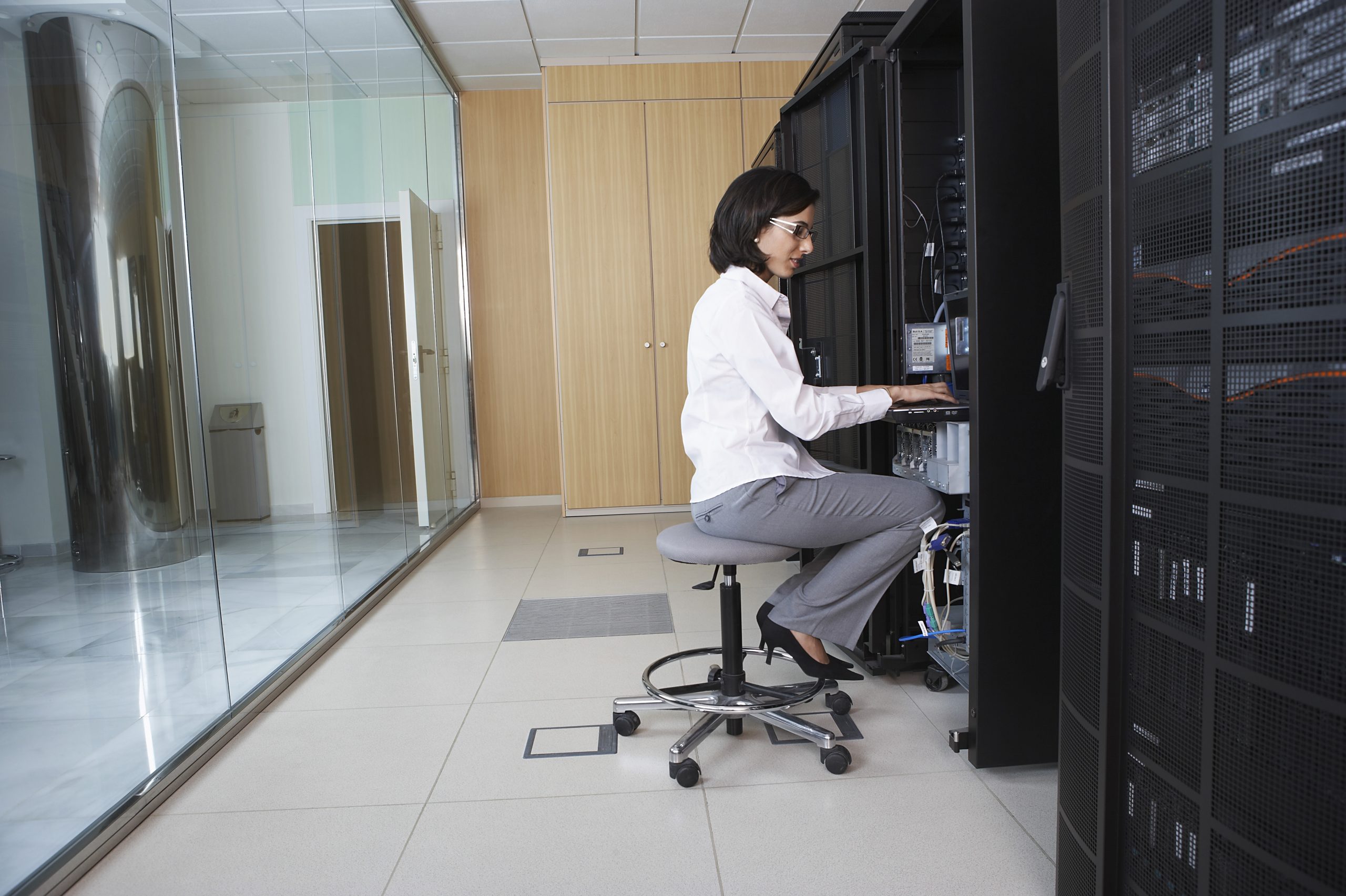 Technician Working in Server Room