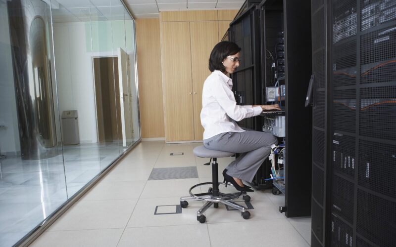 Technician Working in Server Room